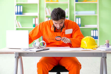 Construction supervisor planning new project in office