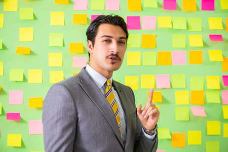 Businessman with many business prioritiesの写真素材
