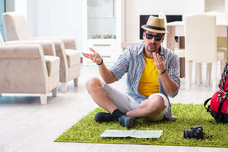 Man planning his travel with mapの写真素材