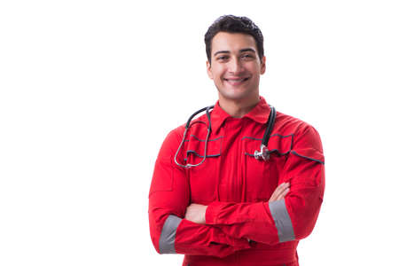Young handsome man with stethoscope in red uniform isolated on wの写真素材