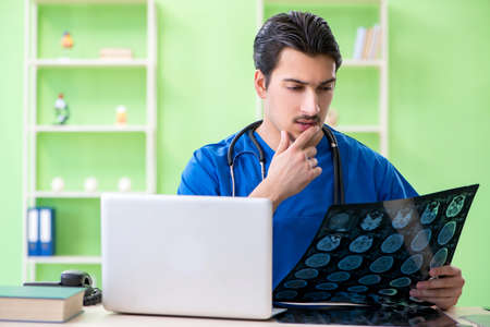 Young doctor working in the hospital