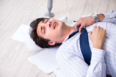 Frustrated businessman stressed from excessive work