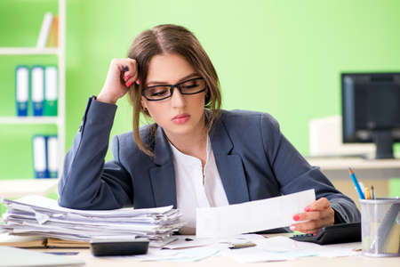 Female financial manager working in the officeの写真素材