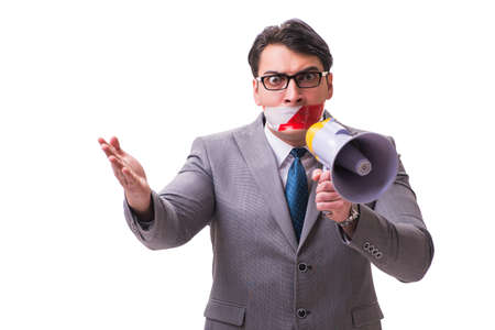 Funny businessman with loudspeaker isolated on whiteの写真素材
