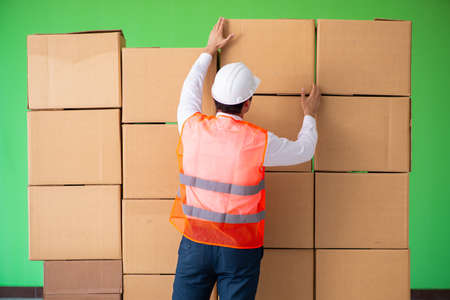 Man contractor working in box delivery relocation service