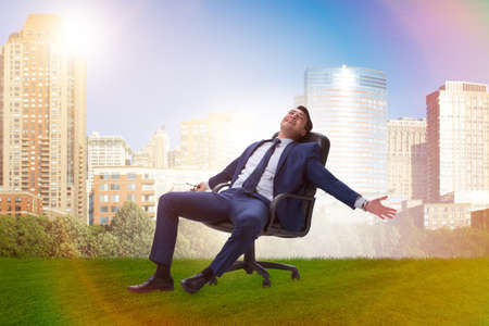 Young male businessman enjoying his time during vacationの写真素材