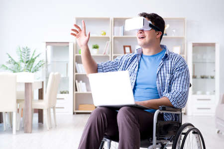 Freelance student studying with laptop and virtual reality glass
