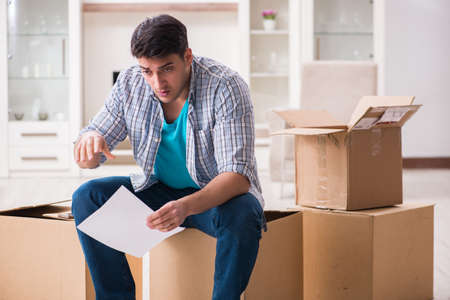 Unemployed man receiving foreclosure notice letter