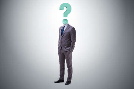 Businessman with question mark instead of his headの写真素材