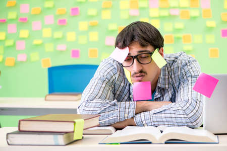 Student with many conflicting prioritiesの写真素材