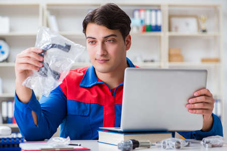 Worker in uniform working on project