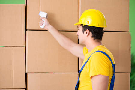 Man contractor working with boxes delivery