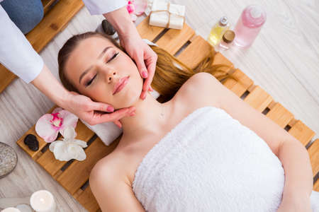 Young woman during spa procedure in salonの写真素材