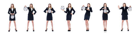 Businesswoman with clock isolated on whiteの写真素材