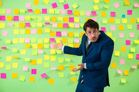 Businessman with many business prioritiesの写真素材