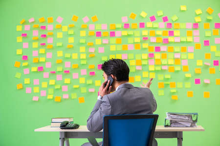 Businessman with many conflicting priorities