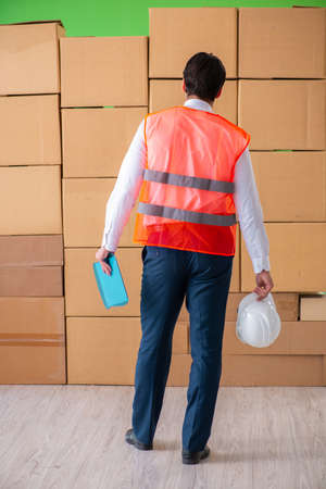 Man contractor working in box delivery relocation serviceの写真素材