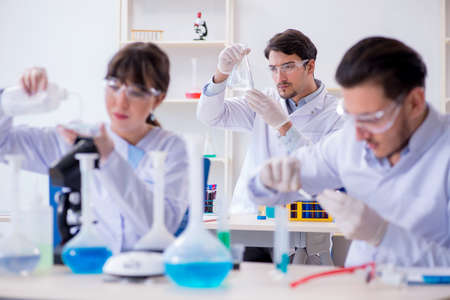 Team of chemists working in the labの写真素材
