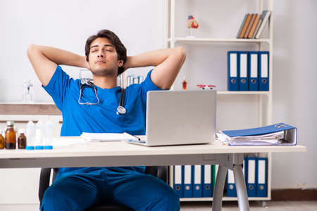 Young doctor working in the hospitalの写真素材