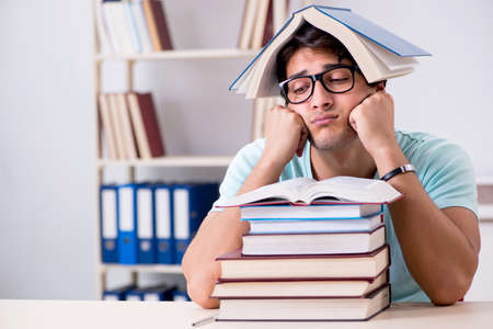 Young handsome student preparing for school examsの写真素材