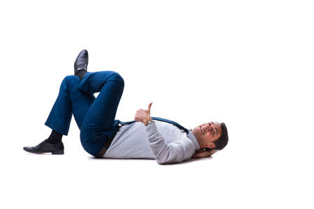 Businessman lying on the floor isolated on white backgroundの写真素材