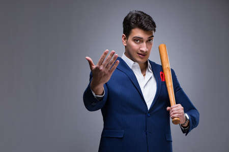 Handsome man against gray background