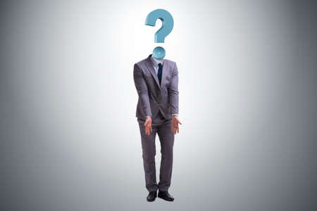 Businessman with question mark instead of his headの写真素材
