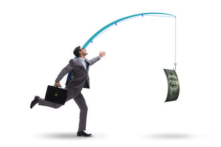 Businessman chasing money on fishing rodの写真素材