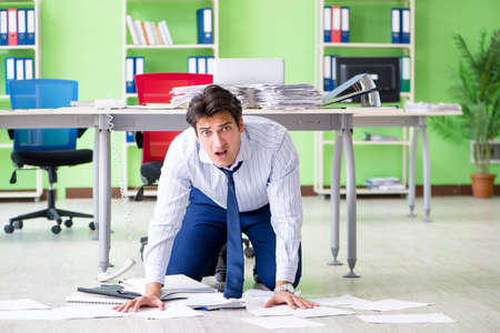 Frustrated businessman stressed from excessive work