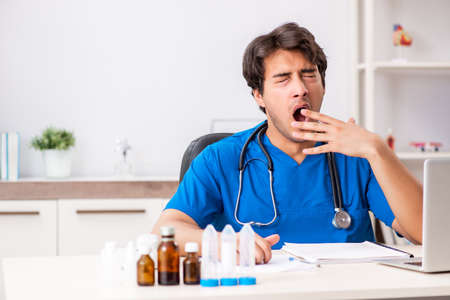 Young doctor working in the hospitalの写真素材