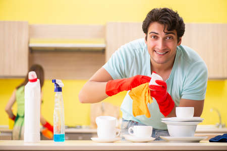 Young couple working at kitchen