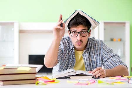 Student preparing for university exams with many conflicting priの写真素材