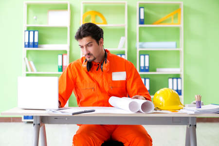 Construction supervisor planning new project in office