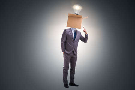 Businessman in thinking out of box conceptの写真素材