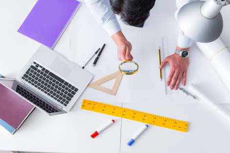 Engineer working on new project drawings