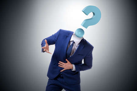 Businessman with question mark instead of headの写真素材