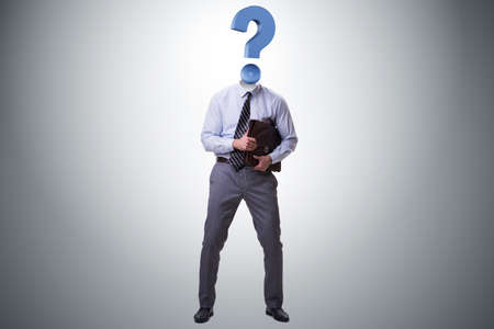 Businessman with question mark instead of his headの写真素材