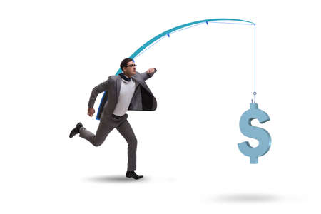 Businessman chasing money on fishing rodの写真素材