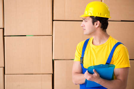 Man contractor working with boxes deliveryの写真素材