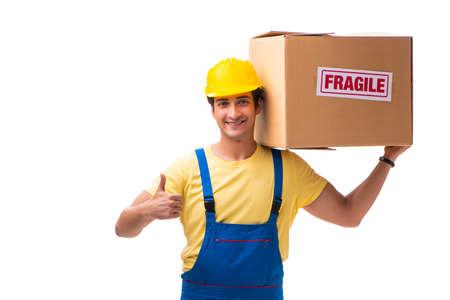 Young contractor with fragile boxes isolated on whiteの写真素材