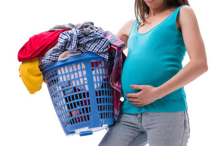 Woman holding basket of dirty clothing requiring washingの写真素材