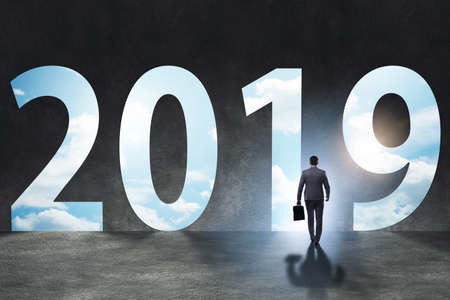 Businessman in the concept of transition to year 2019の写真素材