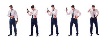 Businessman wounded in gun fight isolated on whiteの写真素材