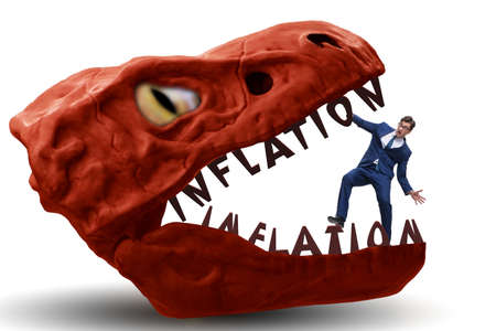 Businessman in inflation business conceptの写真素材