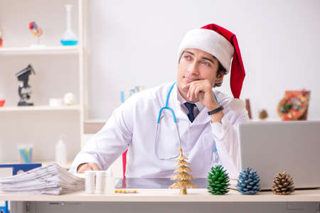 Doctor on the shift on christmas eveの写真素材