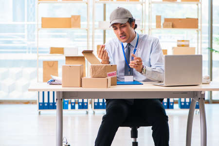 Male employee working in box delivery relocation serviceの写真素材