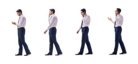 Businessman walking standing side view isolated on white backgroの写真素材