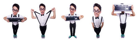 Nerd hacker with computer keyboard on whiteの写真素材