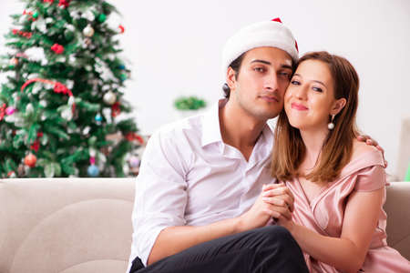 Man making marriage proposal at christmas dayの写真素材