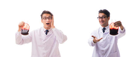 Doctor in blood donation concept isolated on whiteの写真素材